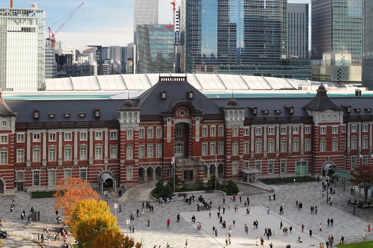 Tokyo Station and urban skyline in autumn — foreign tourist gateway to exploring Japan with confidence